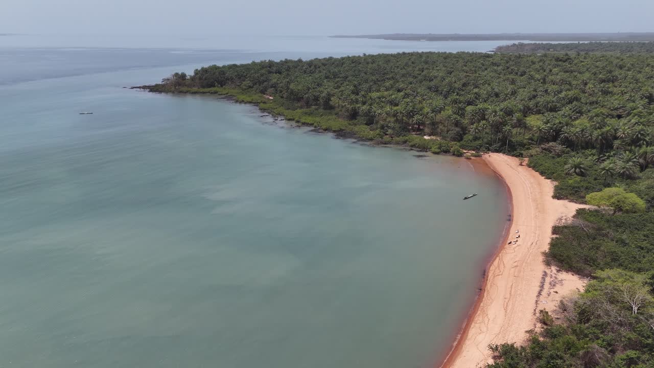 Stunning aerial drone flight over Pink Sand Beach in Bijagós Islands, Guinea-Bissau, highlighting natural beauty and tranquility