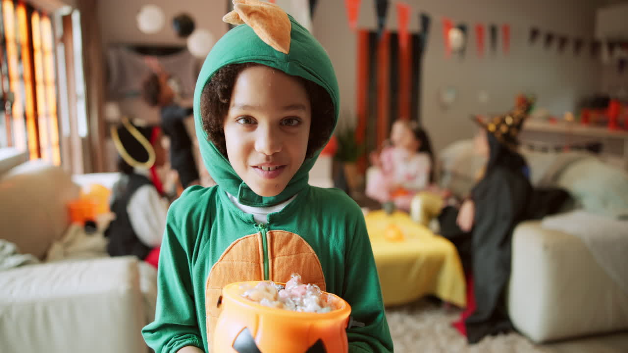 Halloween celebration with kids in costumes