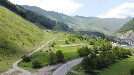 Following-two-large-white-trucks-through-the-mountains-in-Georgia