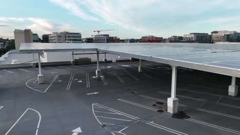 large parking garage with solar panel array roof