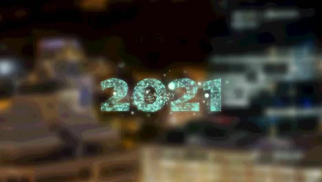 2021 text over fireworks bursting against aerial view of night cityscape