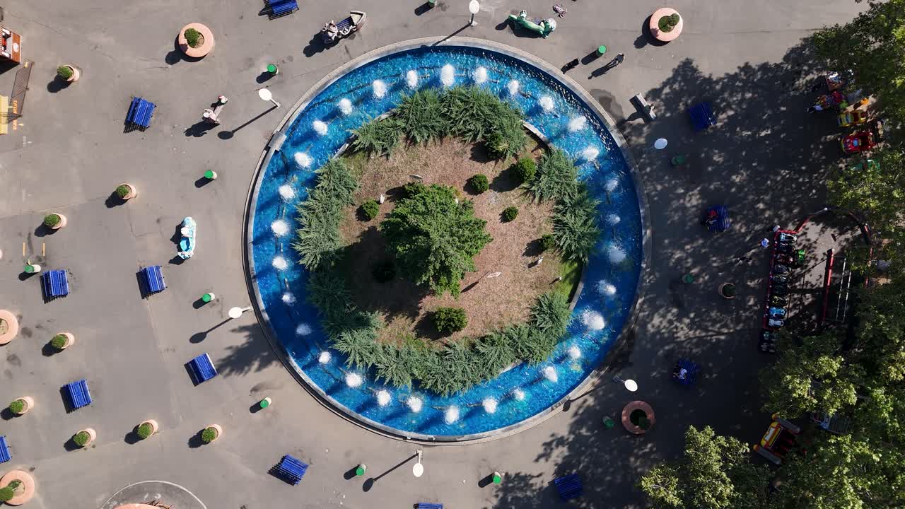 Aerial View of a Circular Fountain in a Park