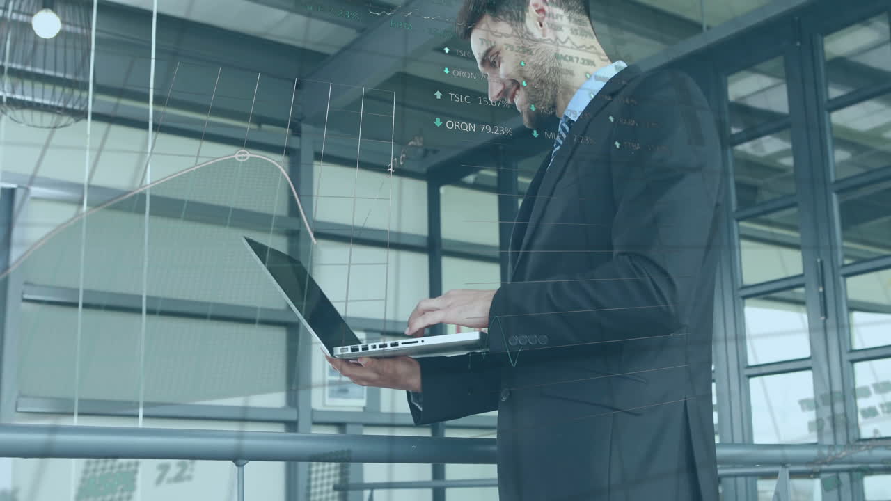 Animation of financial data processing over caucasian businessman using laptop