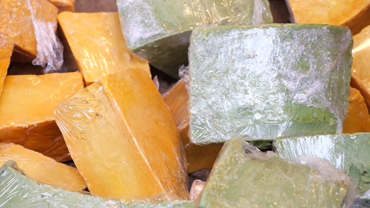 Colorful Handmade Soap Blocks Wrapped in Plastic