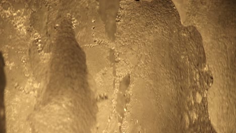 close up of water spouting from a fountain