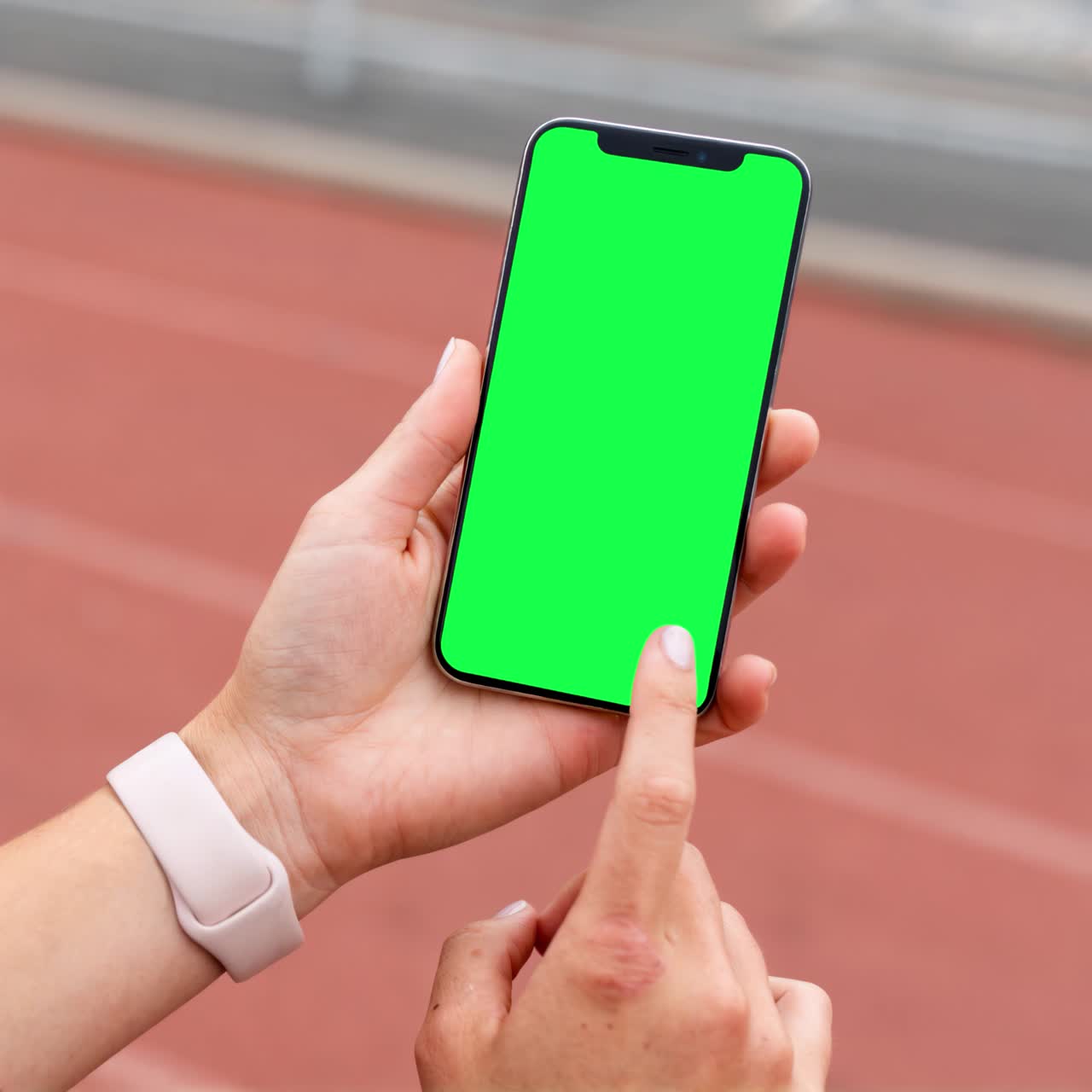 Smartphone screen live mockup at running track animation, transparent 4K video, green screen