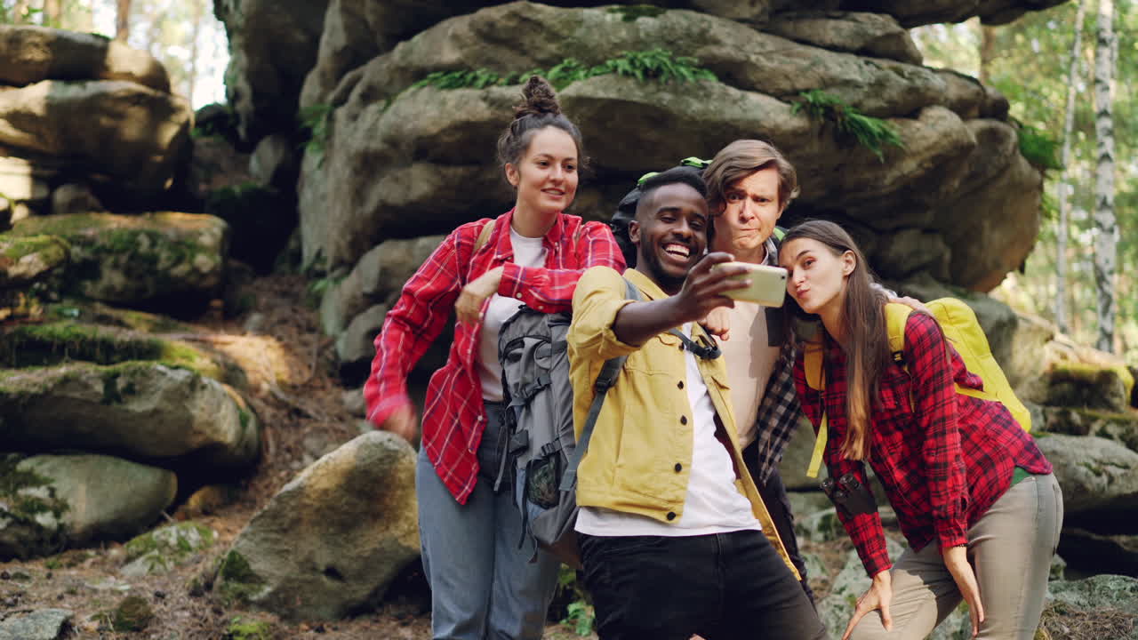 Friends Hiking and Taking a Selfie in the Woods