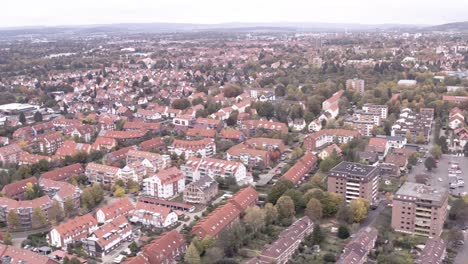 drone circling over the roofs of goettingen südstadt and reinhaeuser landstraße captured by a drone aerial shot in late autumn