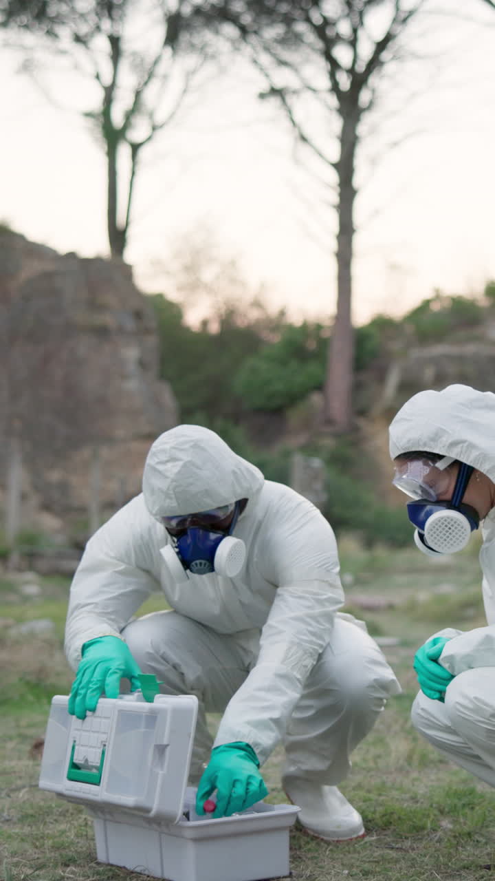 Scientists in hazmat suits conducting research
