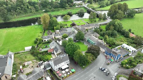 kilkenny ireland inistioge village and the river nore flowing under the bridge in summer