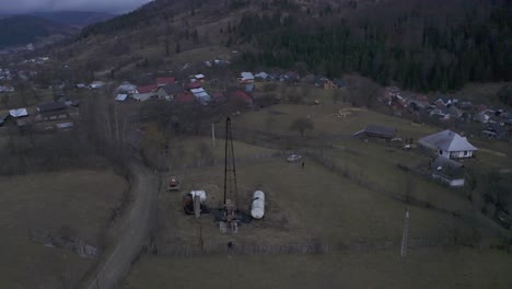 ariel drone footage of farms along a hillside