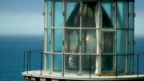 close up view a lighthouse flashing light to warn ships of danger on the oregon coast