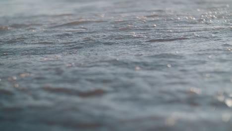 Foamy-waves-rolling-in-on-the-sea-shore