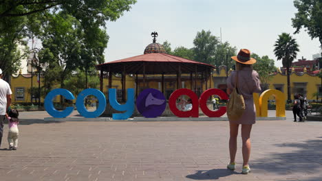 tourists visit the kiosk and sign in plaza hidalgo in the historic center of mexico city