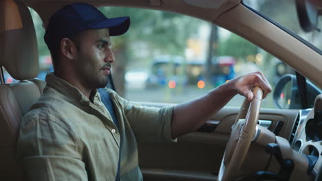 man driving a car