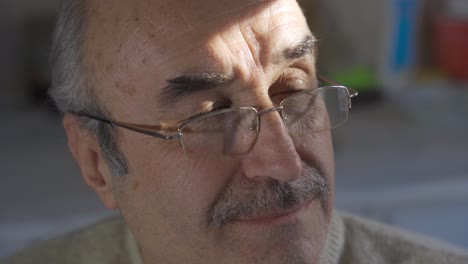 Close-up-portrait-of-thoughtful-old-man.