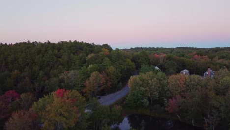 A-push-in-shot-over-a-small-river-and-road-in-Maine