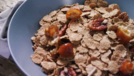 Wheat-flakes-with-dried-fruits-in-a-bowl-4k