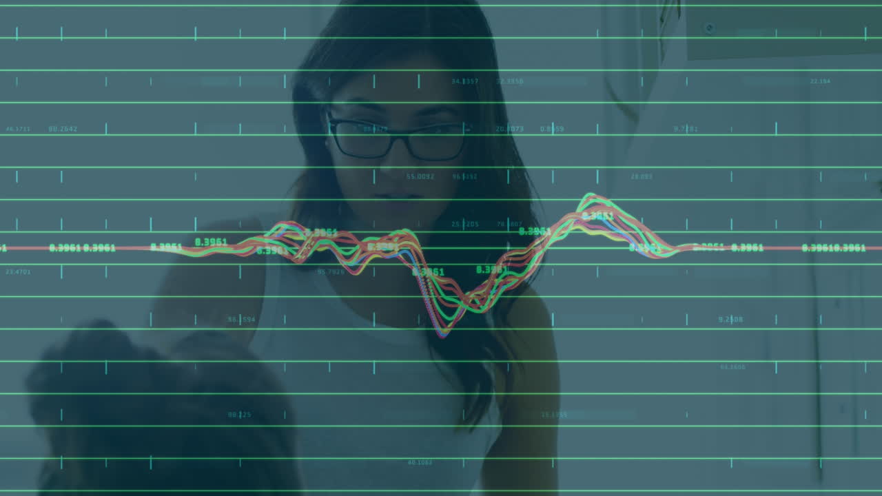 Animation of financial data processing over businesswomen working in office