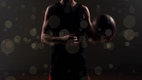 animación de un jugador de baloncesto caucásico lanzando la pelota y puntos de luz en fondo negro