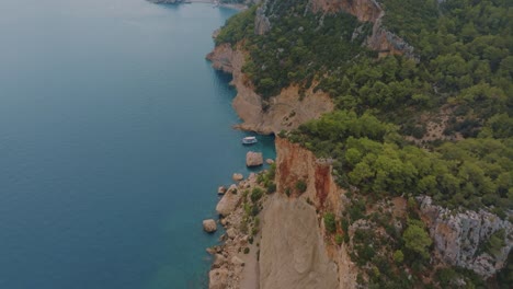 coastal landscape with boat and cliffside scenery