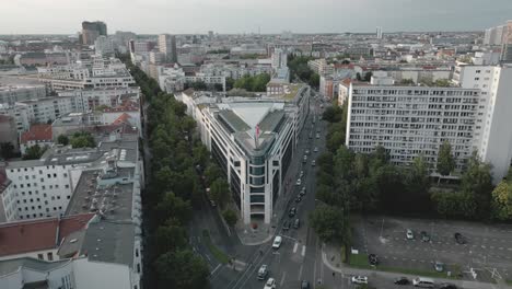 aerial view of urban junction, triangular building crossing through main avenue