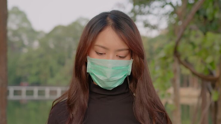 Woman Wearing Face Mask in Park