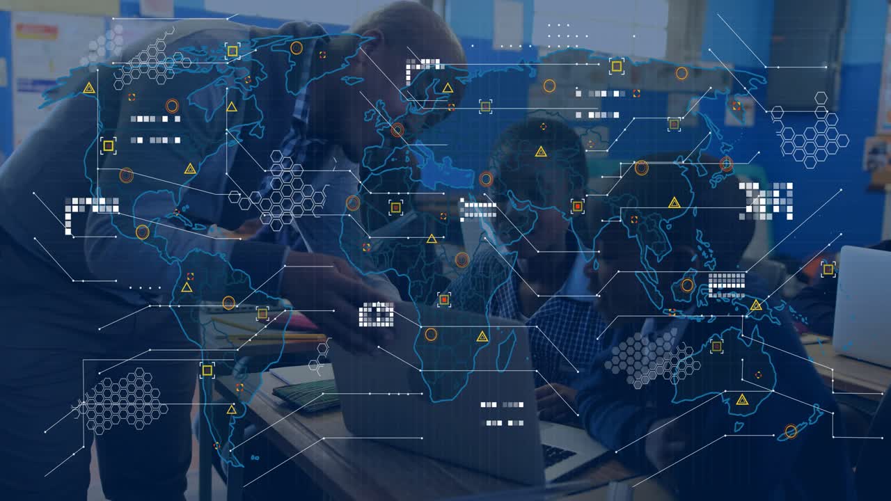 Teacher leaning over desk guiding students using laptops with map overlay charts for education