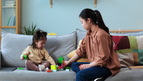 asian mother with her baby