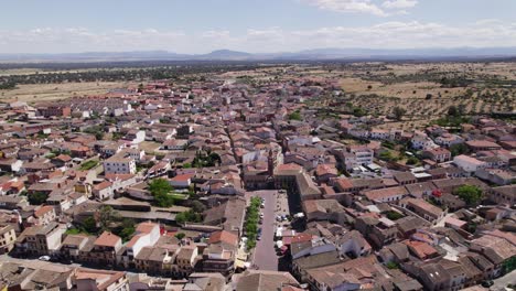 oropesa spanish small town traditional neighbourhood building aerial view orbiting scenic bright countryside