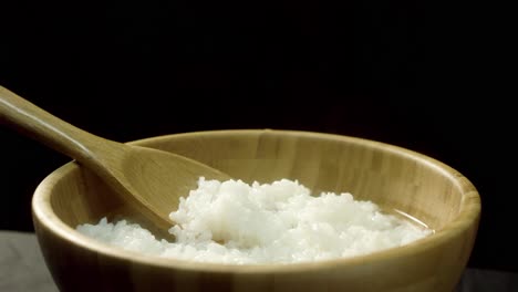 steamed rice in wooden bowl