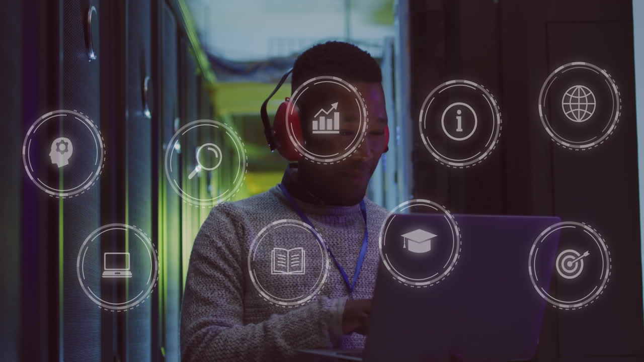 Animation of data processing over african american male it engineer by computer servers