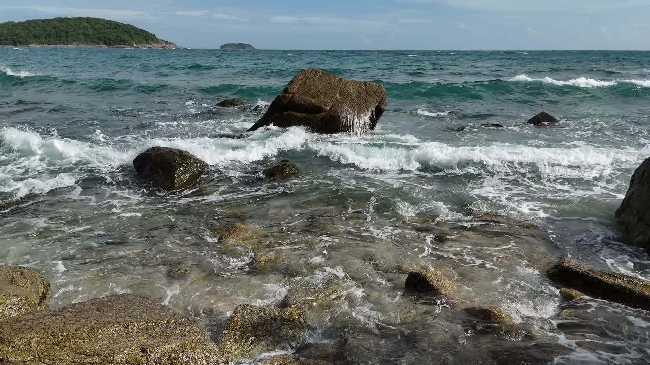 Waves crashing on rocks at the coast