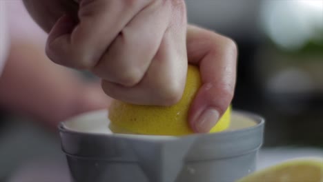squeezing the juice out of a lemon