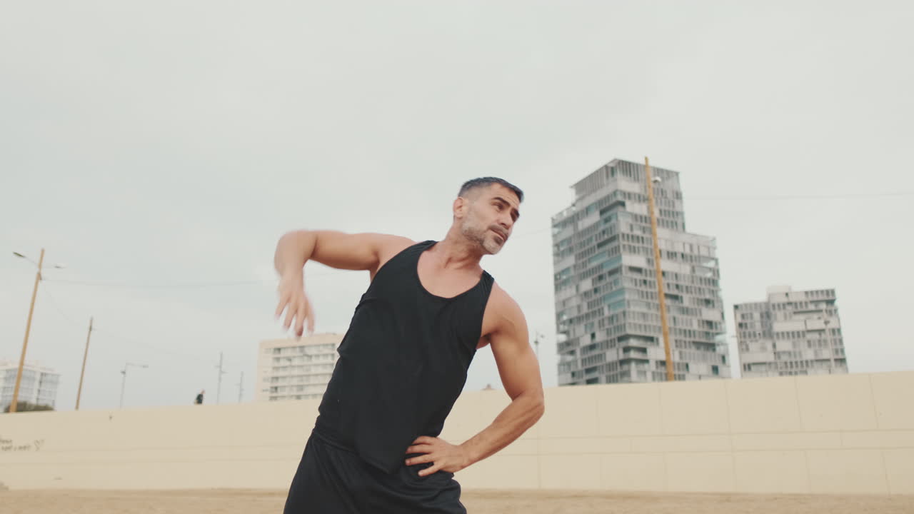 Man exercising on the beach