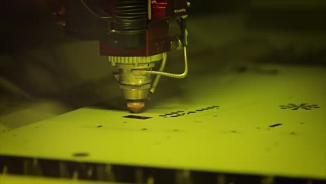 CNC-Laser-cutting-of-metal-in-slow-motion,-modern-industrial-technology.