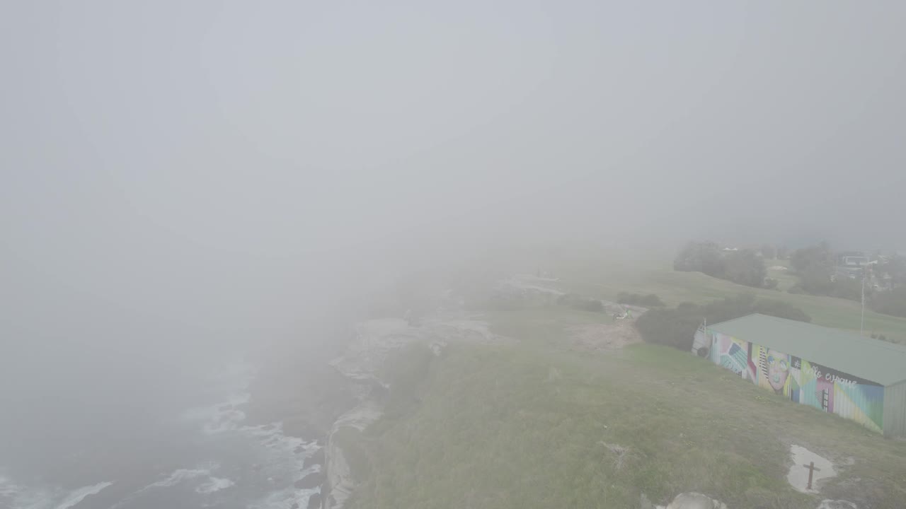 Thick Low-lying Fog Covering Coastal Cliffs Of Bondi