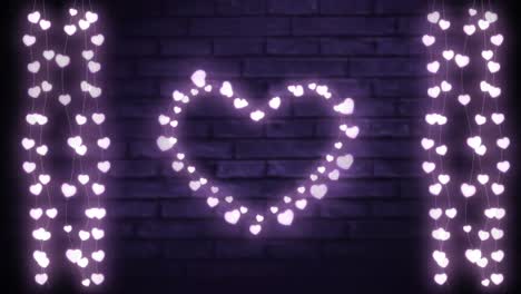 Glowing-heart-and-strings-of-fairy-lights-on-brick-wall
