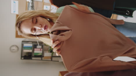 friends trying on clothes