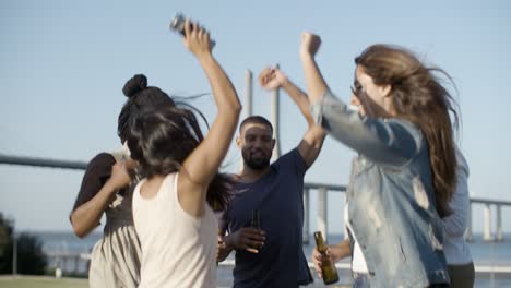 happy company jumping with raised hands