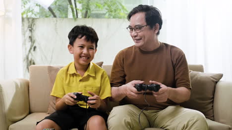 Asian-man-and-boy-in-the-living-room