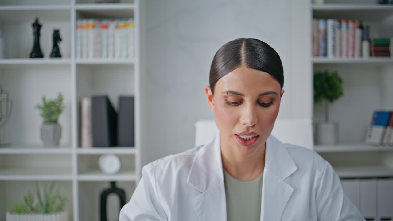 Physician consulting web chat sitting clinic office closeup. Healthcare expert