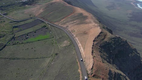 aerial drone view of mountain sea and volcanoes in lanzarote, canary islands, spain