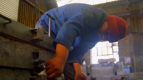 workers working in foundry workshop 4k