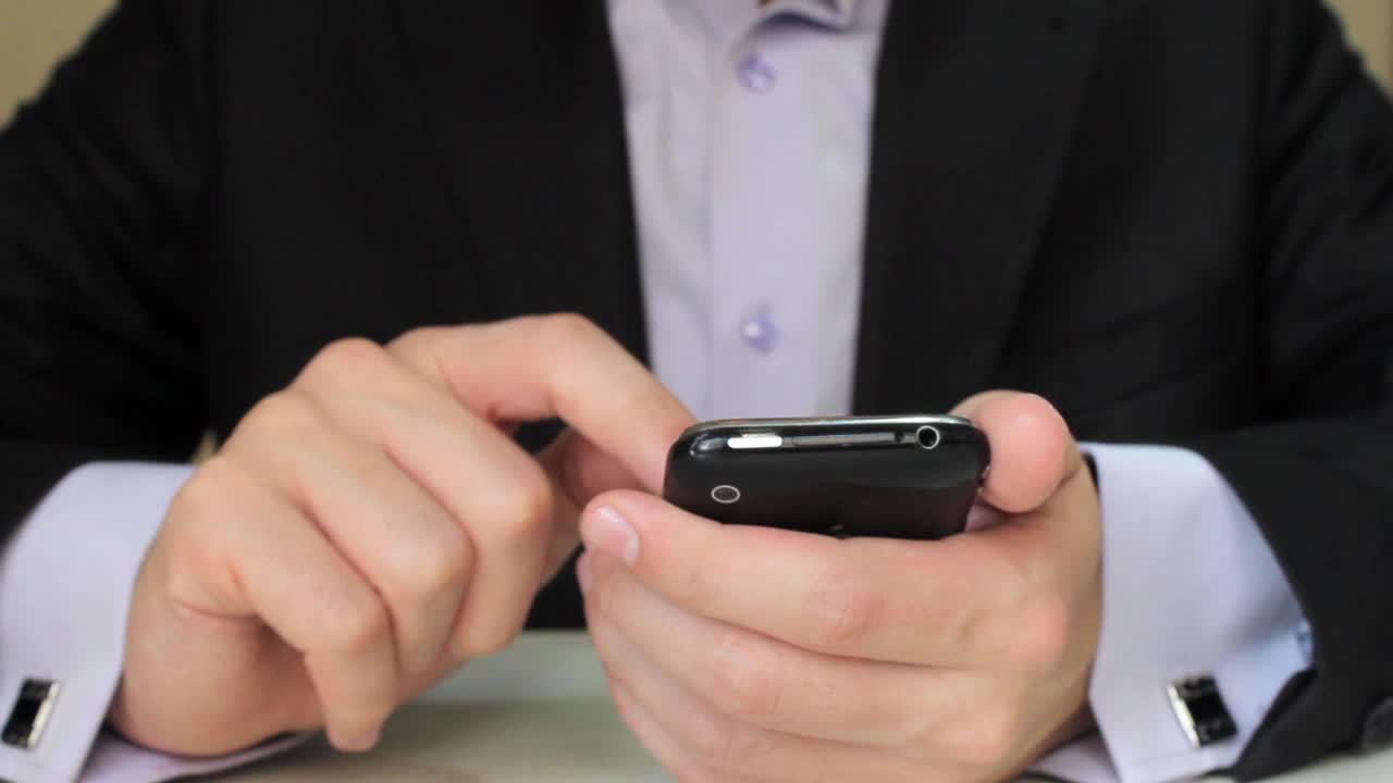 Businessman Using Mobile Phone 7