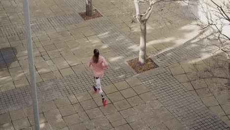 Sporty-Caucasian-woman-exercising-outdoor-during-daytime