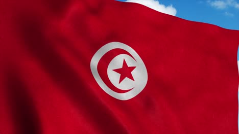 tunisia flag waving in the wind, blue sky background. 4k