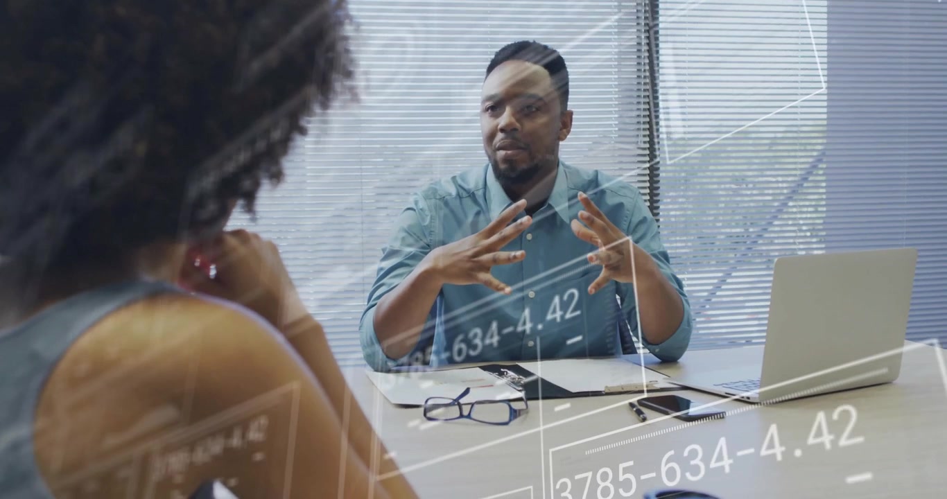Man in business meeting initiating animated architectural data overlays when starting presentation