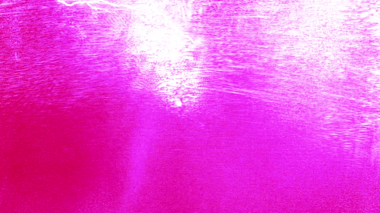 Dynamische rote und pinke Lichtblitze auf dunklem Hintergrund