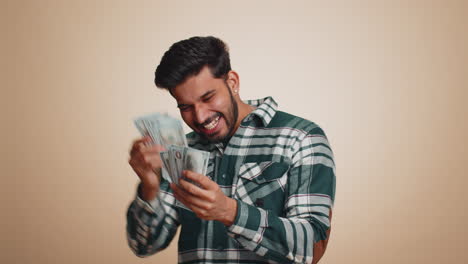 rich pleased boss man waving money dollar cash, success business career, lottery winner big income